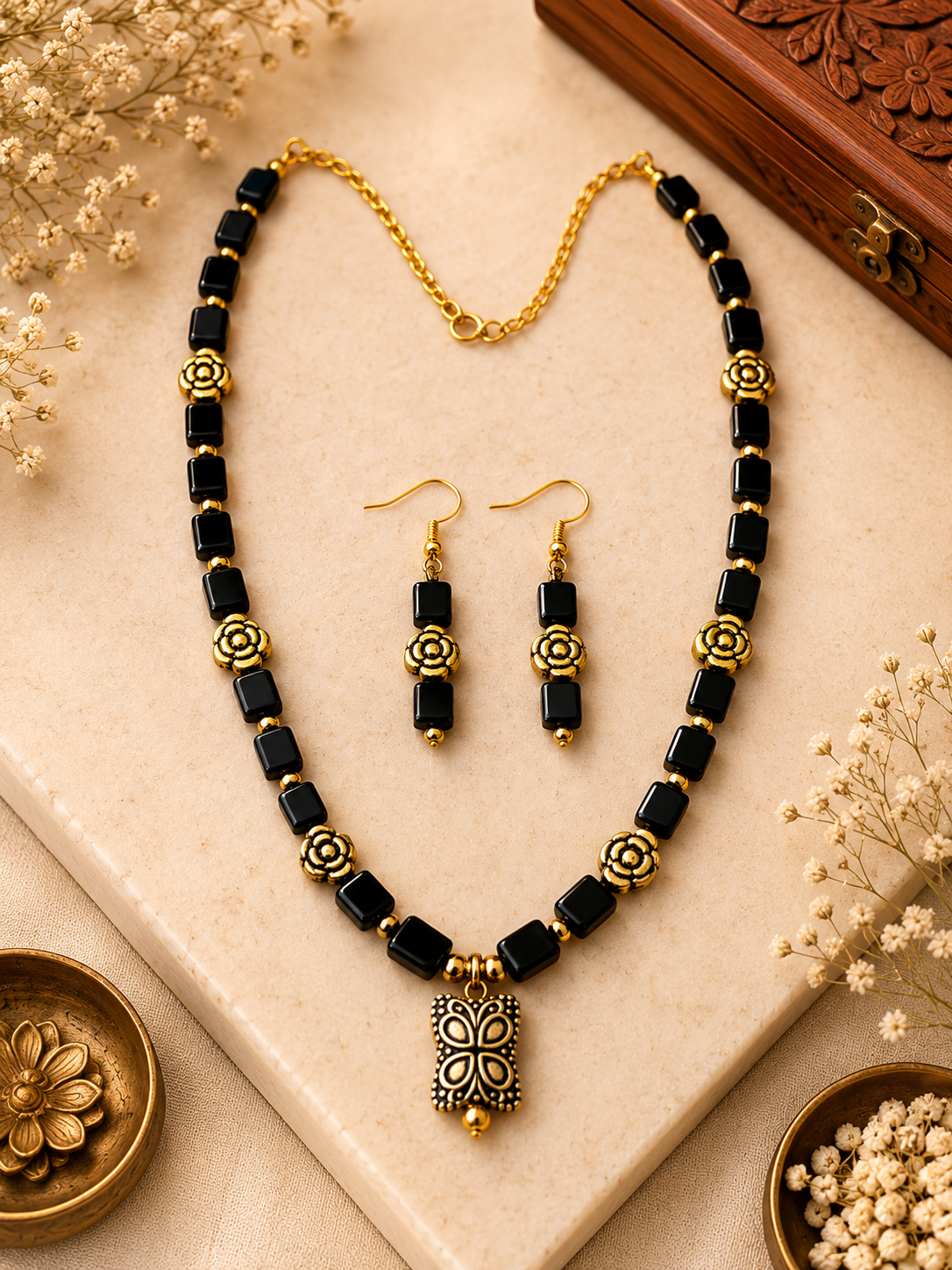 Black rectangular beads with Gold Accents